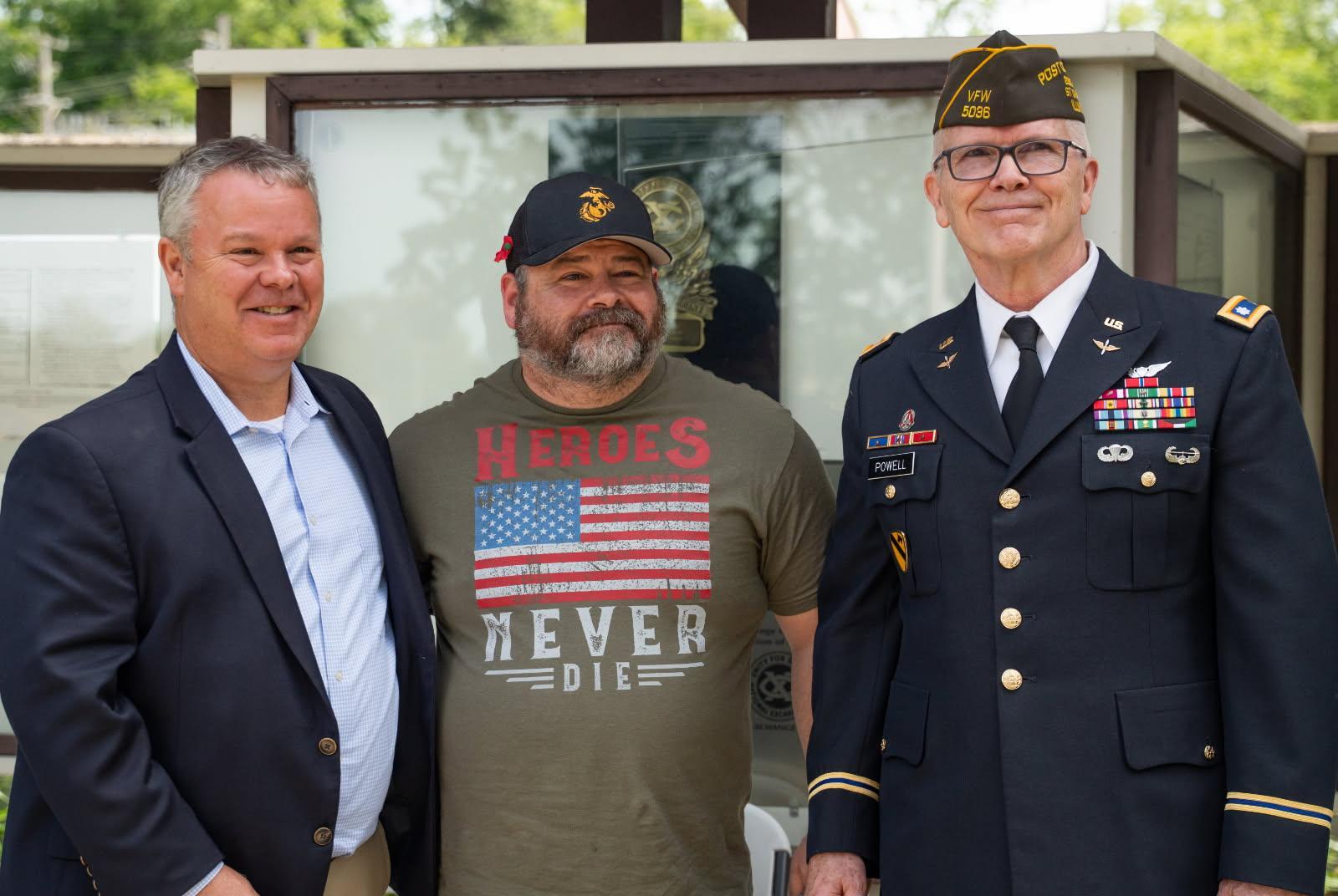 Minor with St. Charles Mayor, Clint Hull and retired Lieutenant Colonel Mark Powell