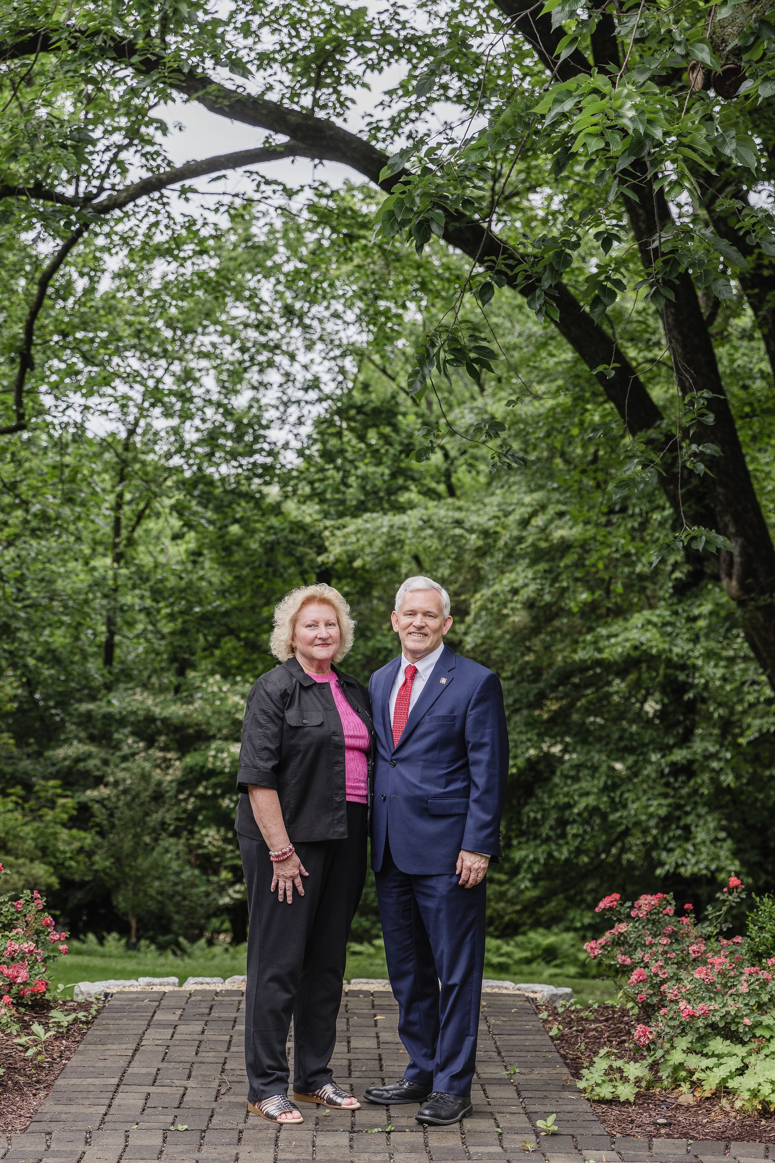 The Algers in their backyard on Nebraska Avenue NW