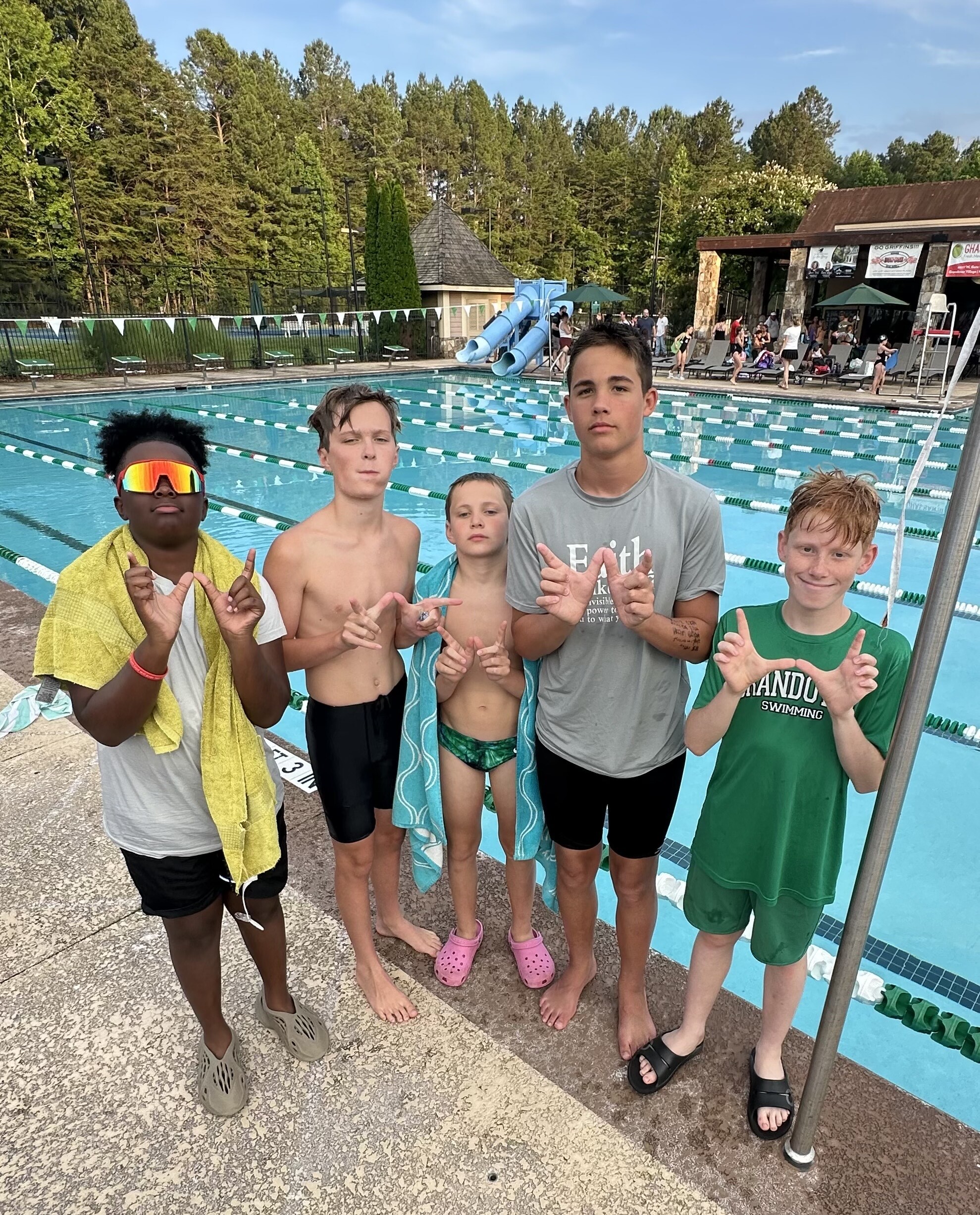 Proud moments on the pool deck! (L to R) Luke Gardner, Rylan Whaley, Keenan Dawson, Oliver Everhart, and Benji Southard
