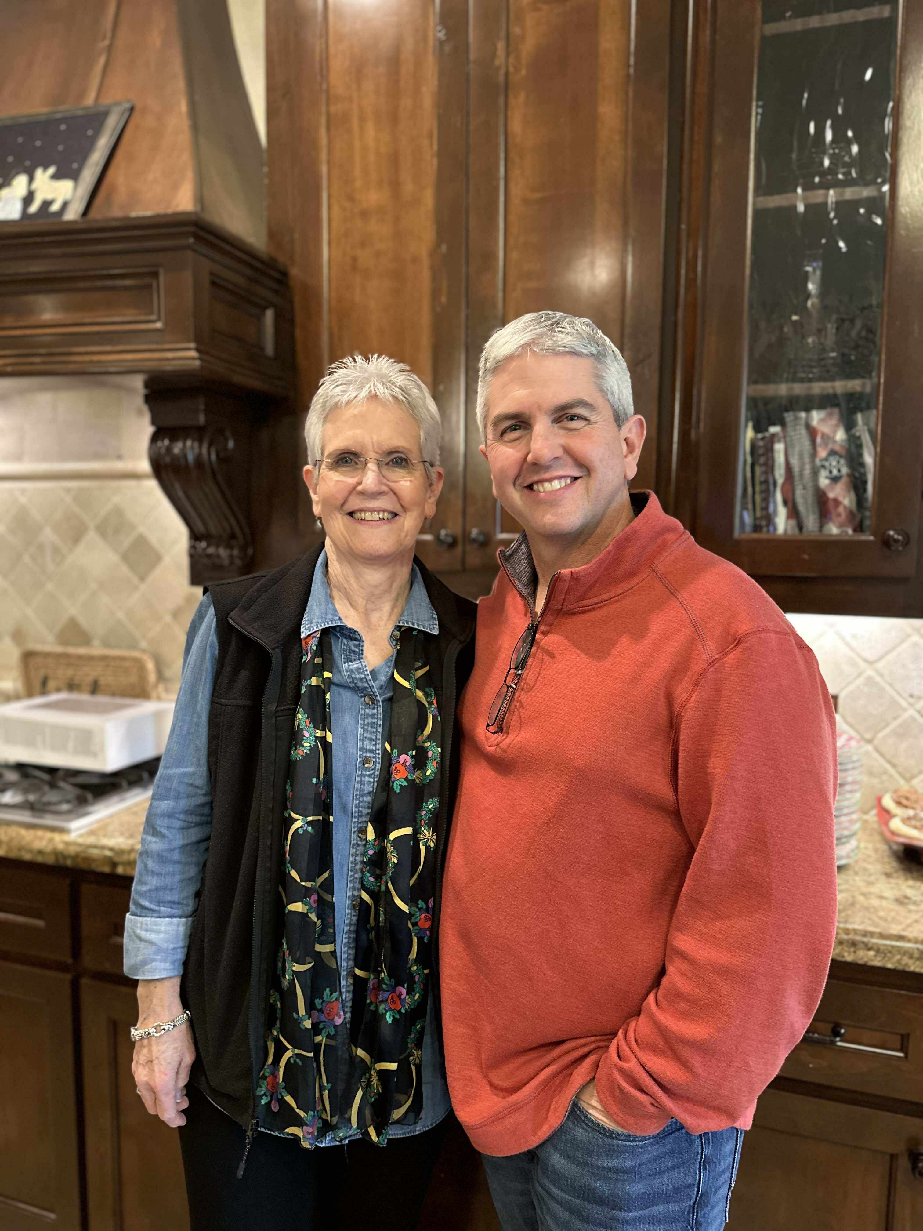 Mrs. Sue Sprott (“Granny”) is pictured with her son, Jeff Dillion