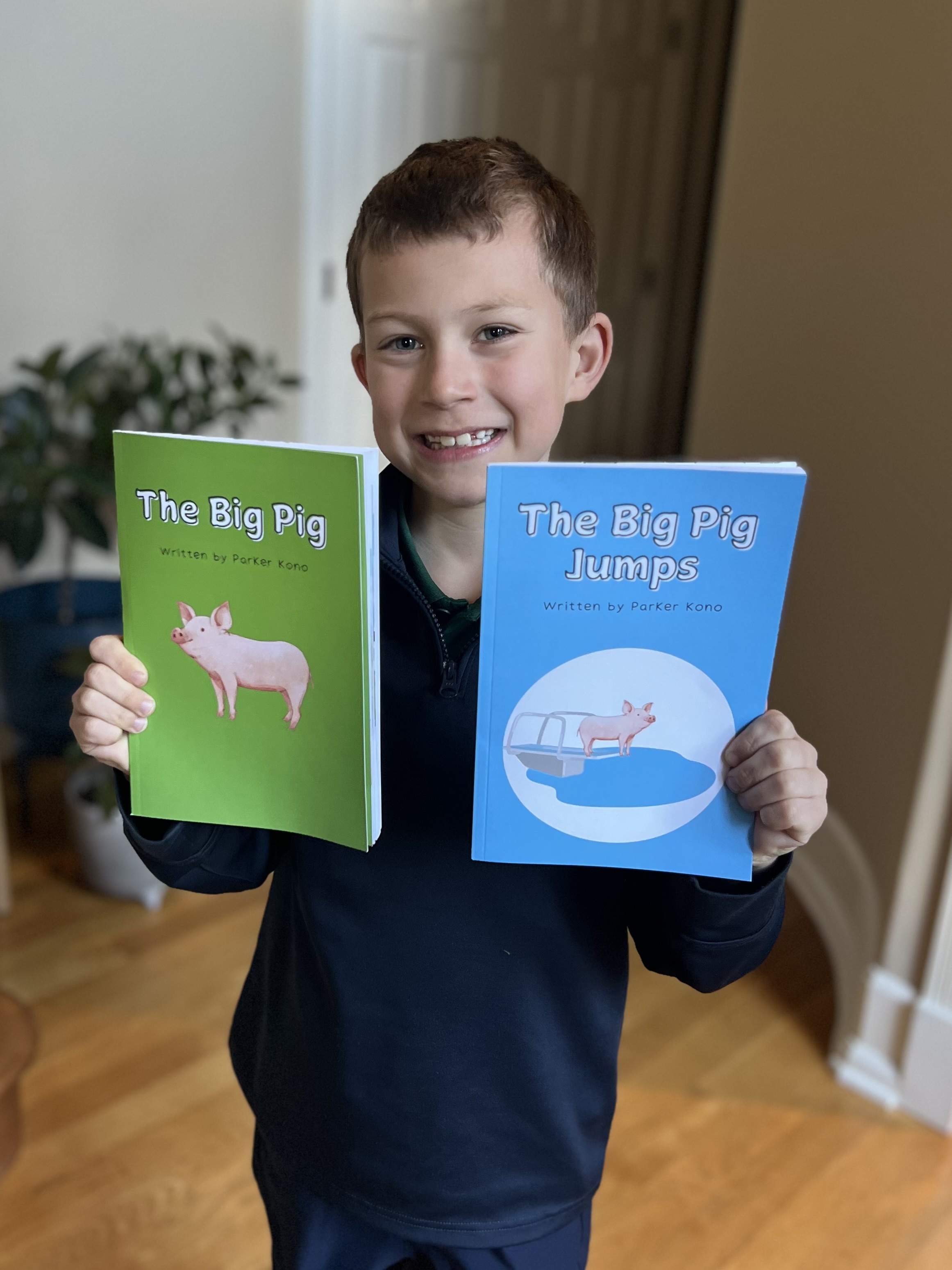 Parker showing off his two published books!