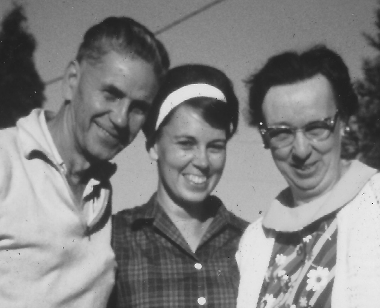 Louise in the late 1950s,  flanked by her father and mother, Fred and Betty McKay.
