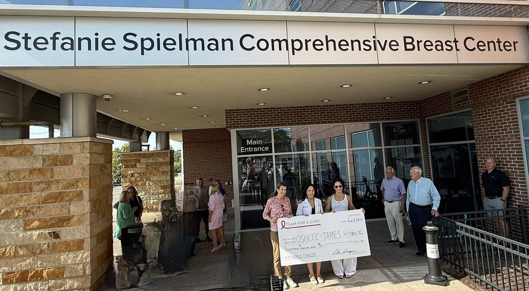 Sarah presented The Spielman Center with a check for $17,000.