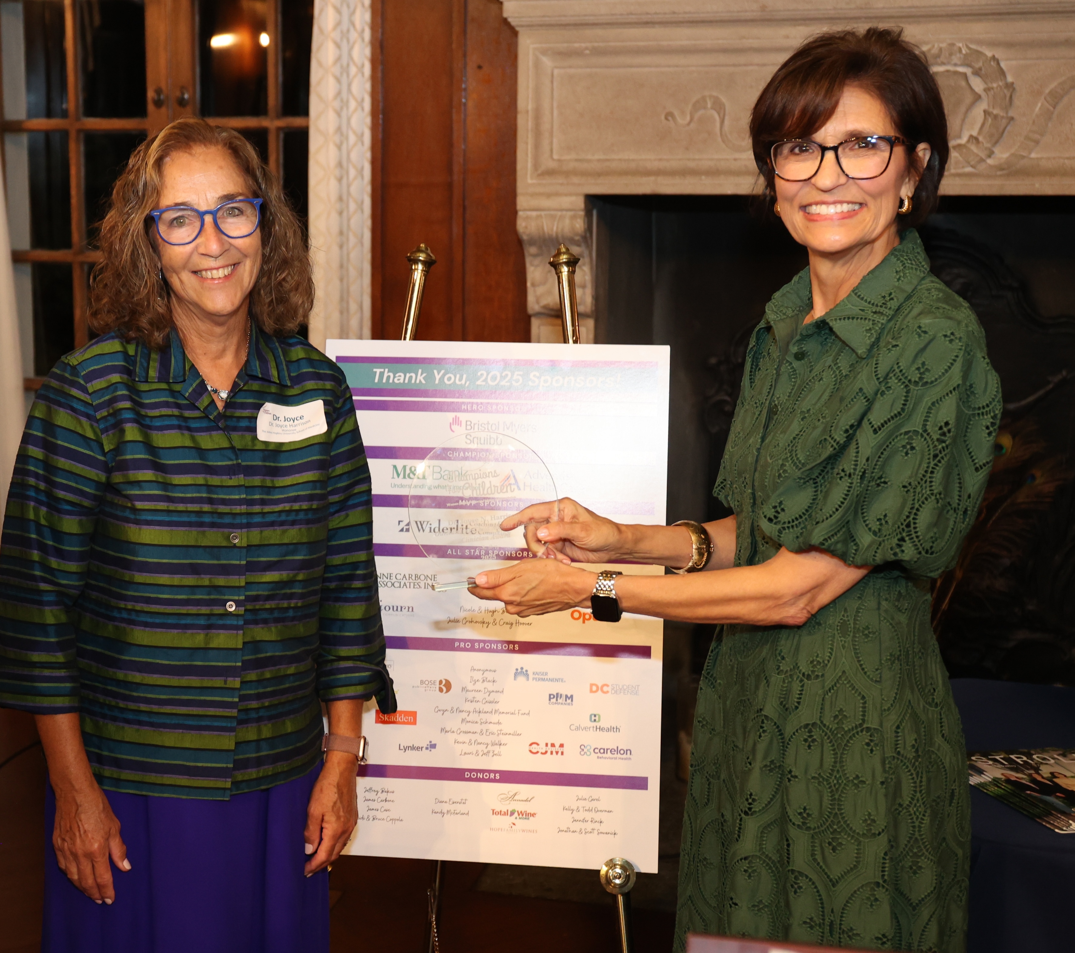 Champions for Children President Paula Widerlite with honoree Dr. Joyce Harrison
