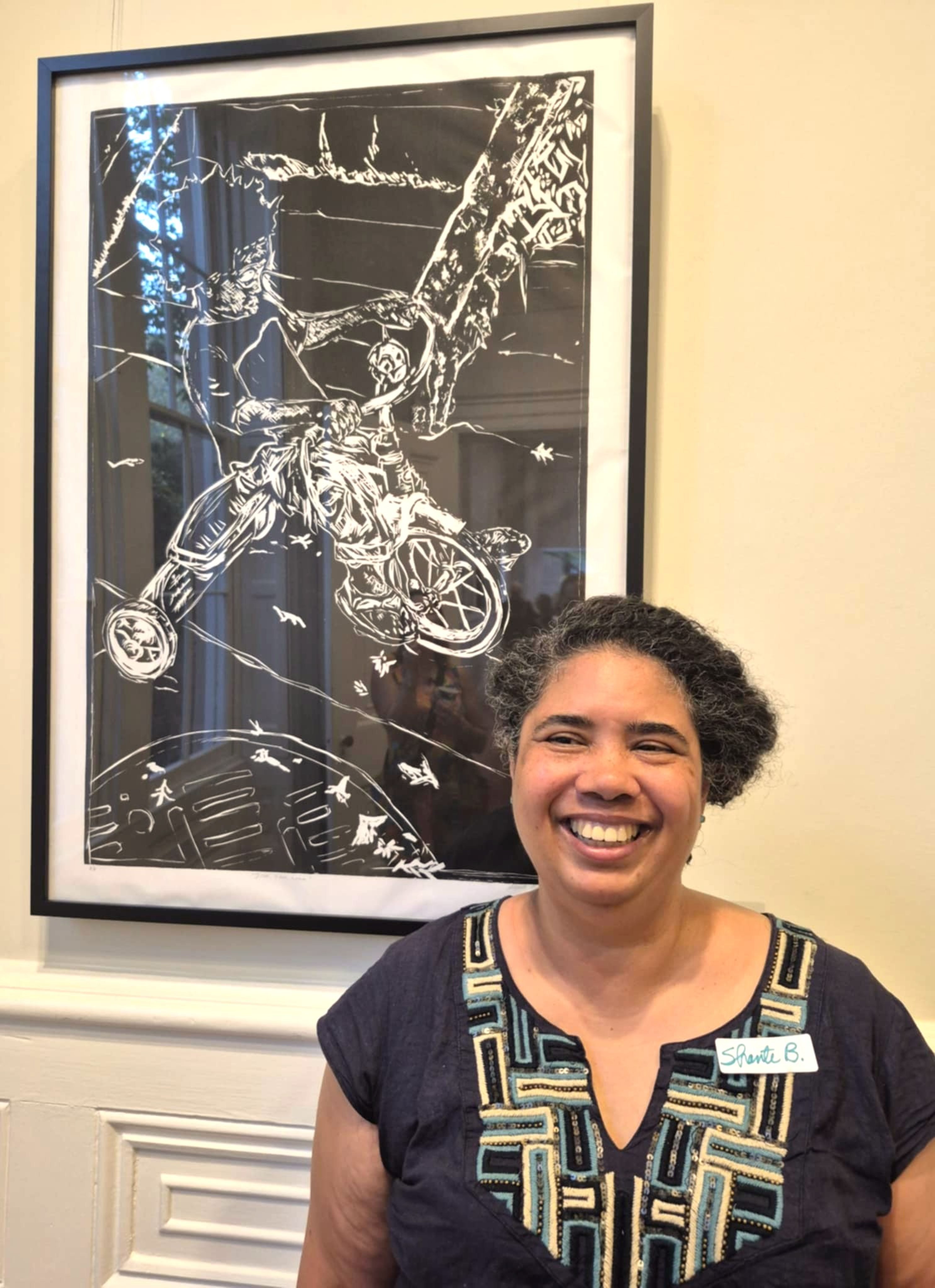 Shante with woodcut at the Atheneum.