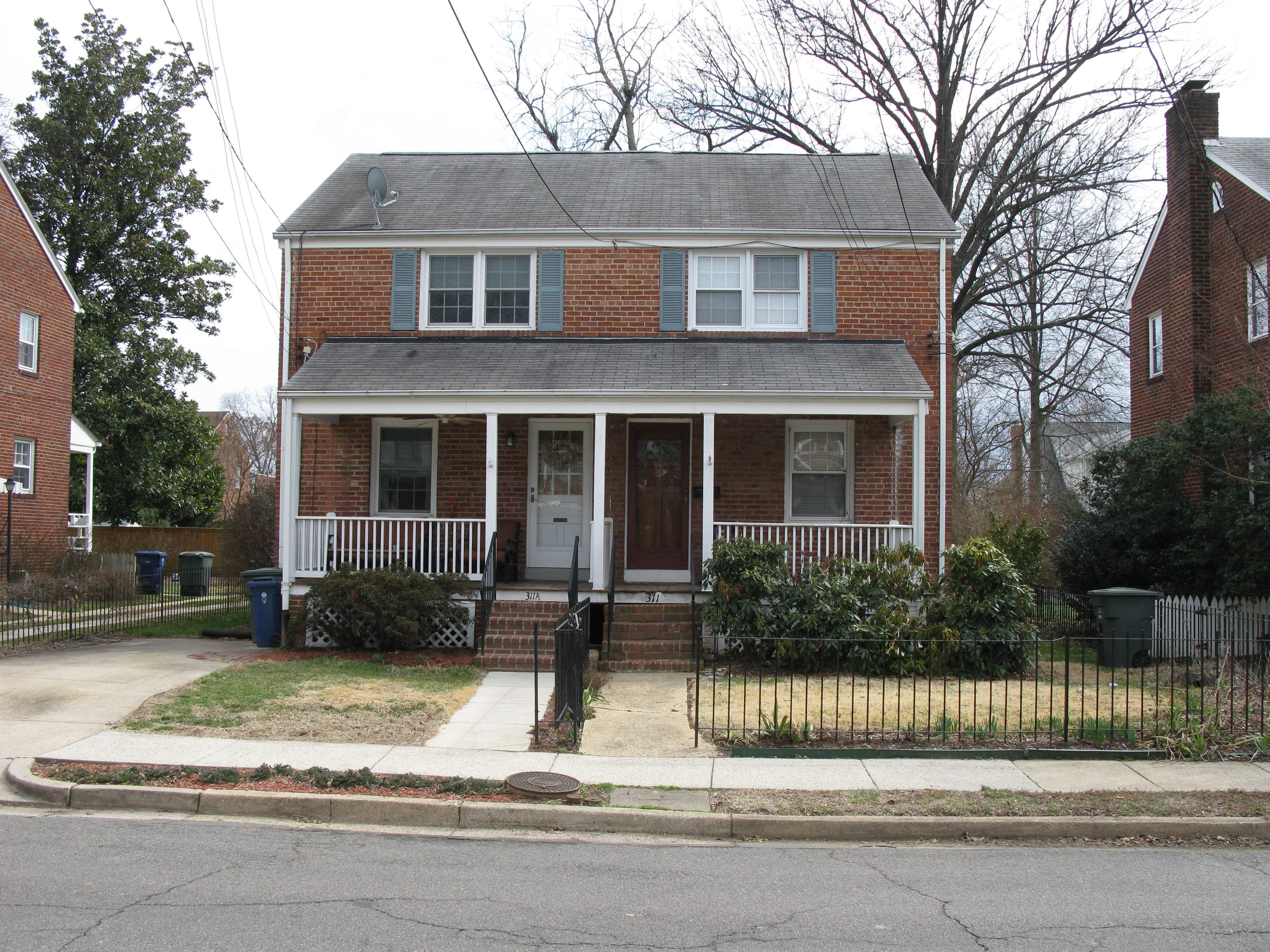 Eighty years after construction, these houses continue to provide affordable (if only relatively) housing, this one on E Del Ray at 311 and 311A.