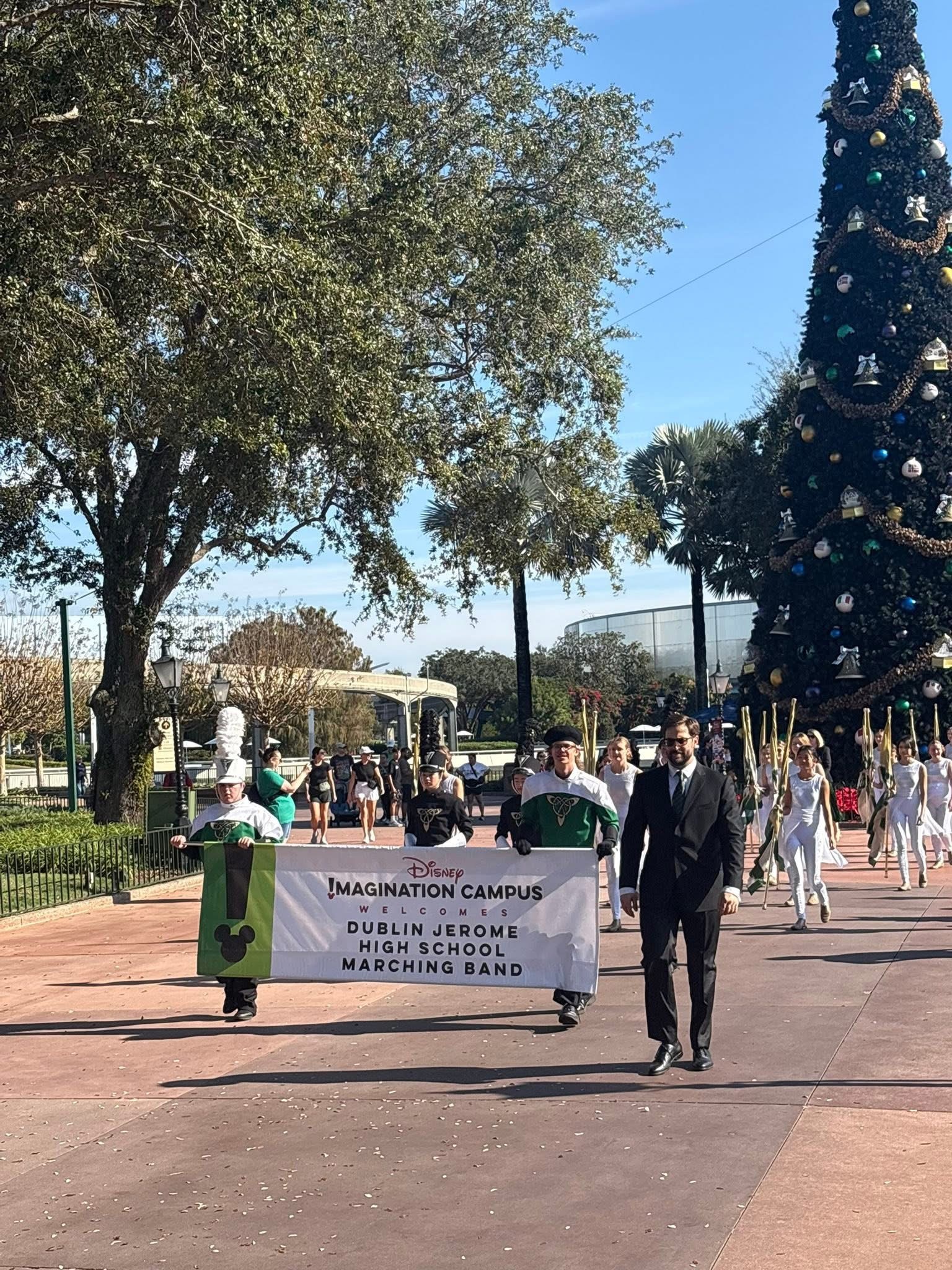 Members of the Dublin Jerome High School Marching Band march through EPCOT during the November 25 parade at Walt Disney World, proudly representing Dublin City Schools.