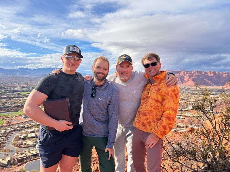 Entrada resident Clete Thompson, with his brother, son, and nephew, preparing for a celebration of life.