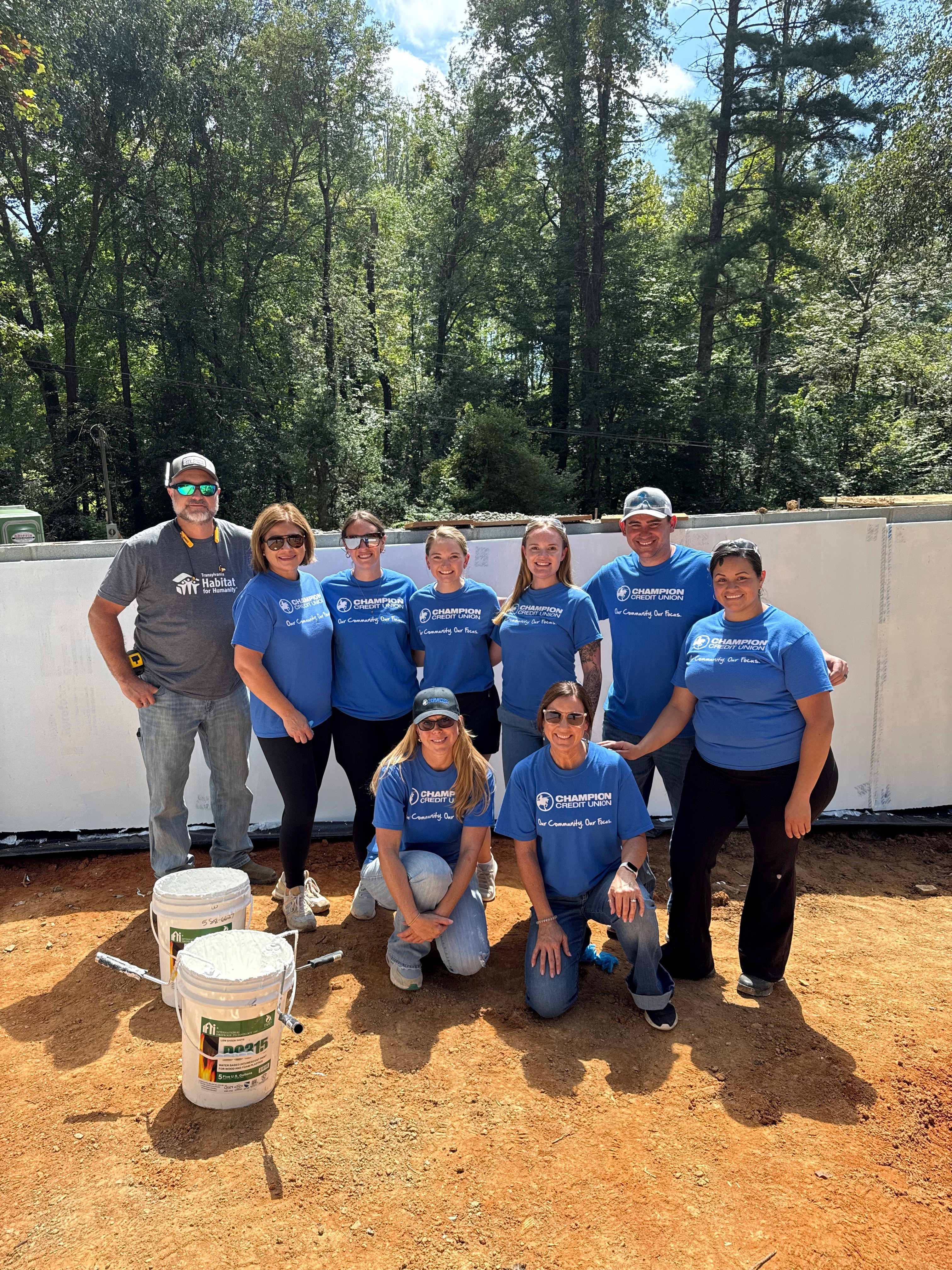 Champion Credit Union employees volunteering at a Habitat for Humanity location.