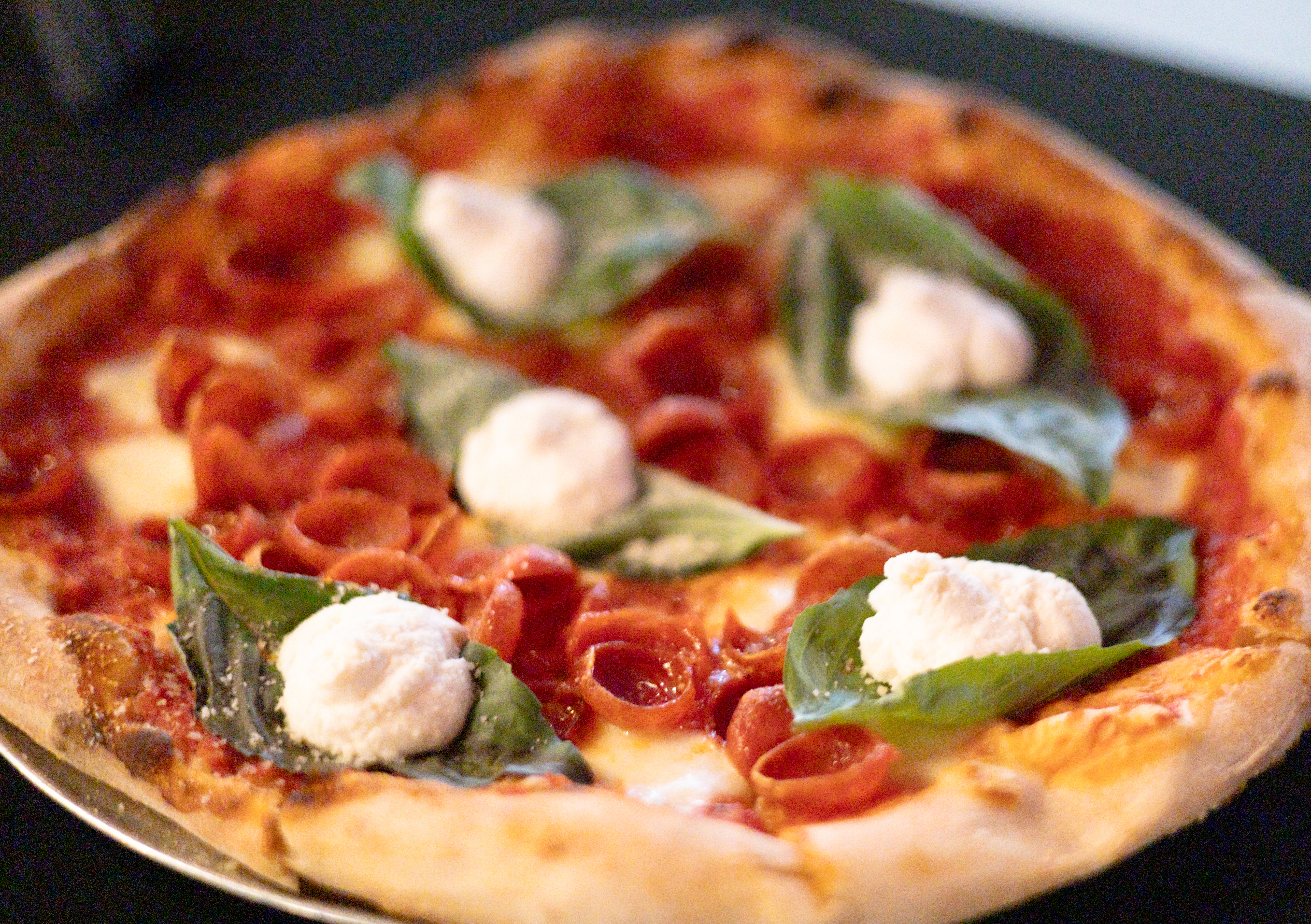 Signature brick oven pizza fresh from the oven