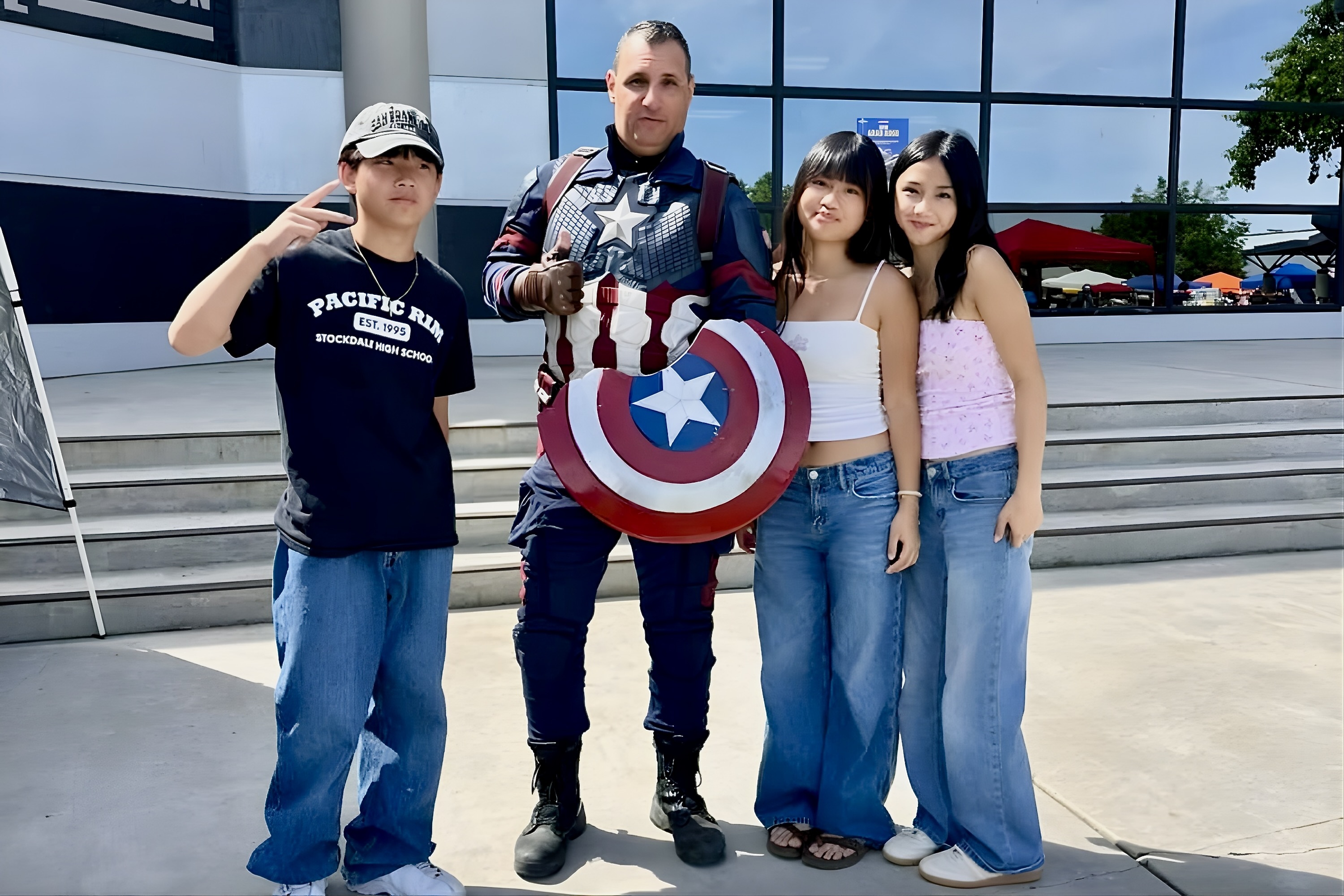 Student posing with Captain America
