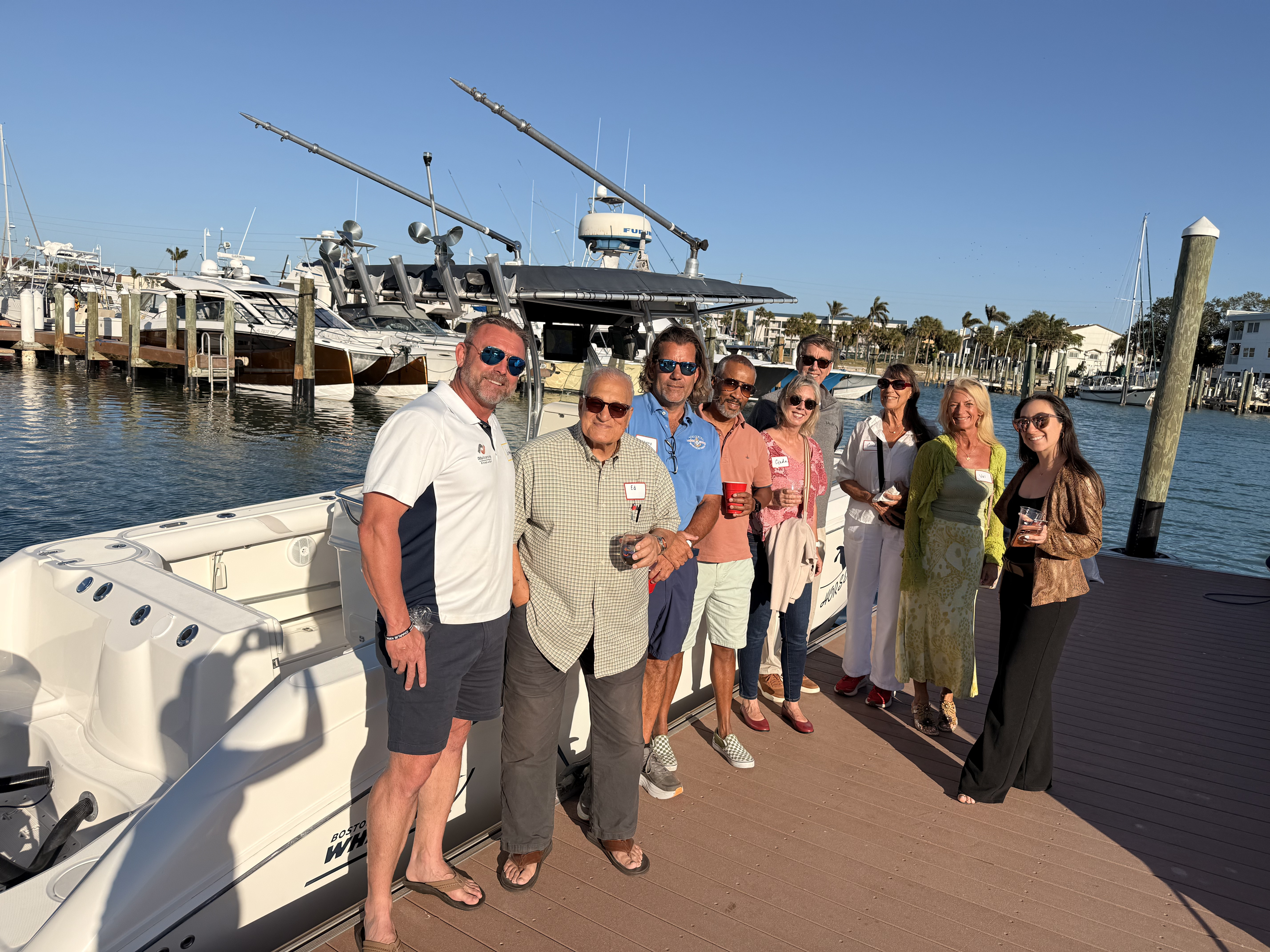 Guests touring the Boston Whaler listed for sale by Worldwide Yacht Sales