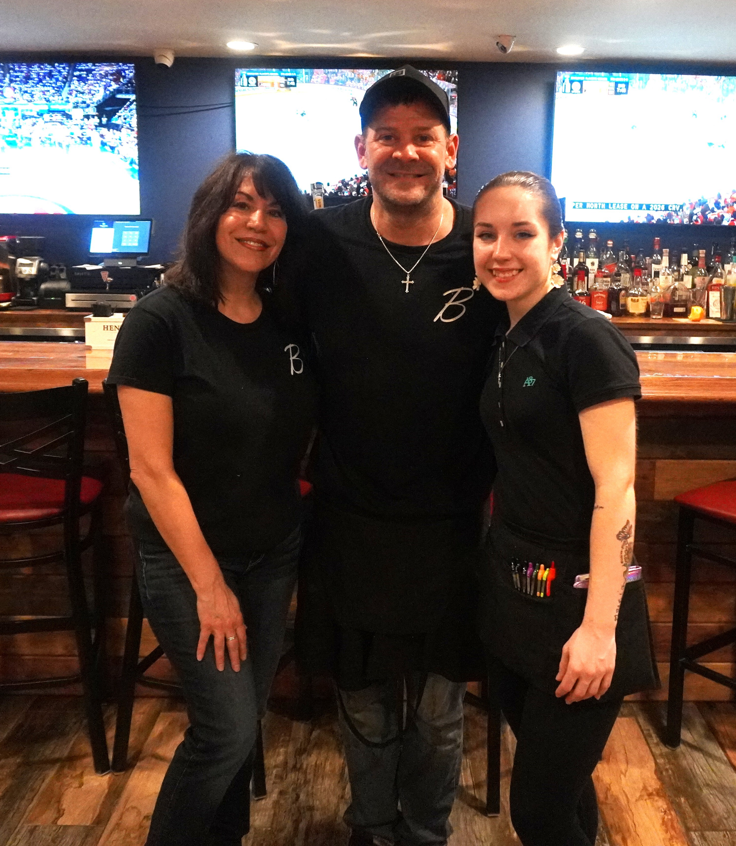 Chad (center) with his team at Bruno’s on Broadway, wrapping up a great night of food, wine, and neighbors.