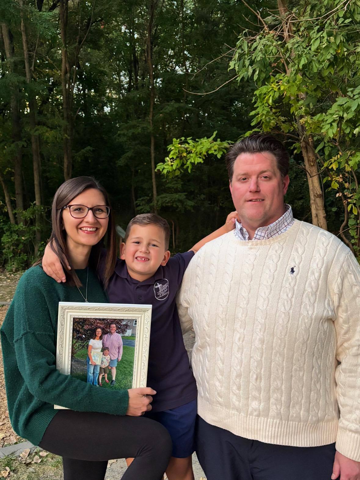 Nicole, John, and John Paul continuing their annual anniversary tradition of recreating the previous year’s family photo at the Burchfield Nature Center in West Seneca.