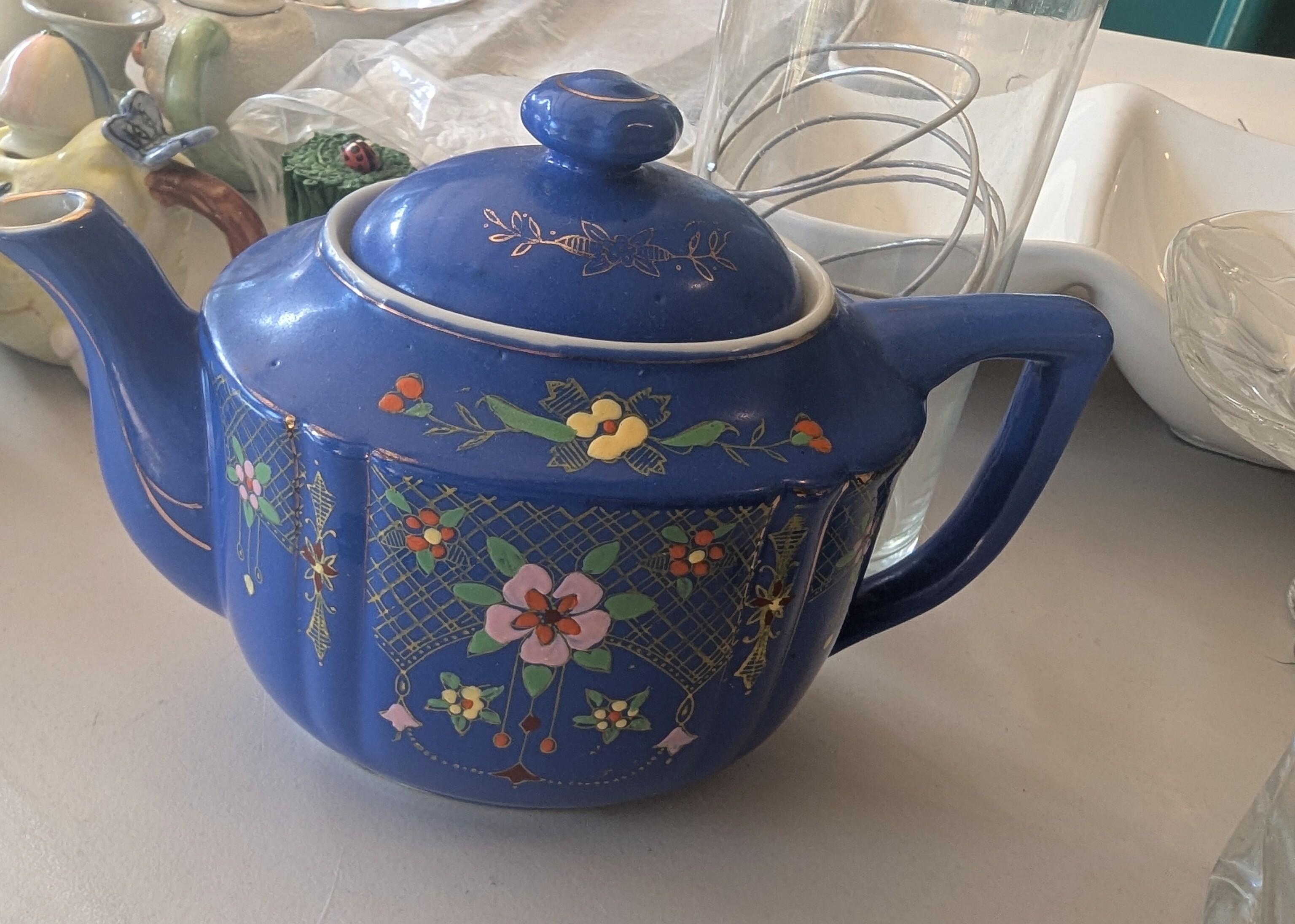 Maggie Hoffman was helping a friend sell items including this beautiful tea pot.