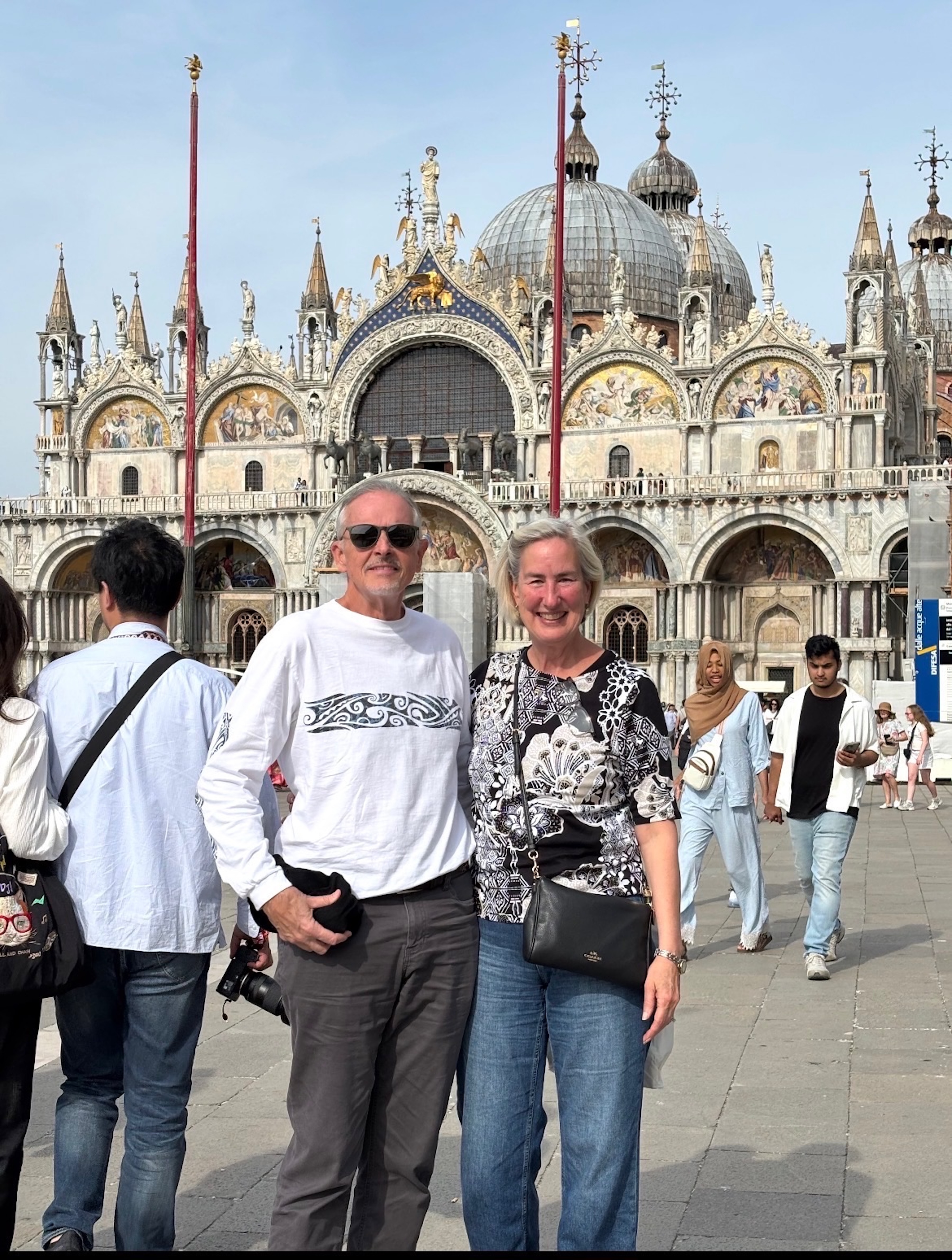 Chris and Mary in front of Basilico of San Marco (St. Mark's) in Venice.