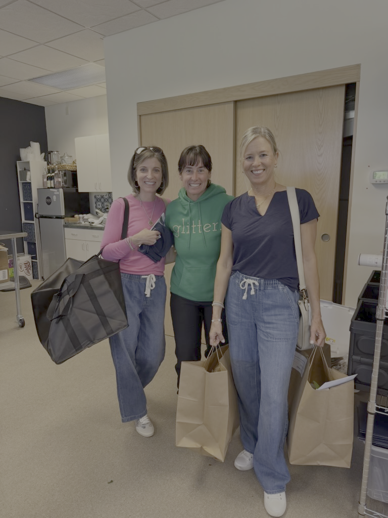 Meal and snack delivery volunteers: Erin Orbin, Jen Lynch and Kathleen Root.