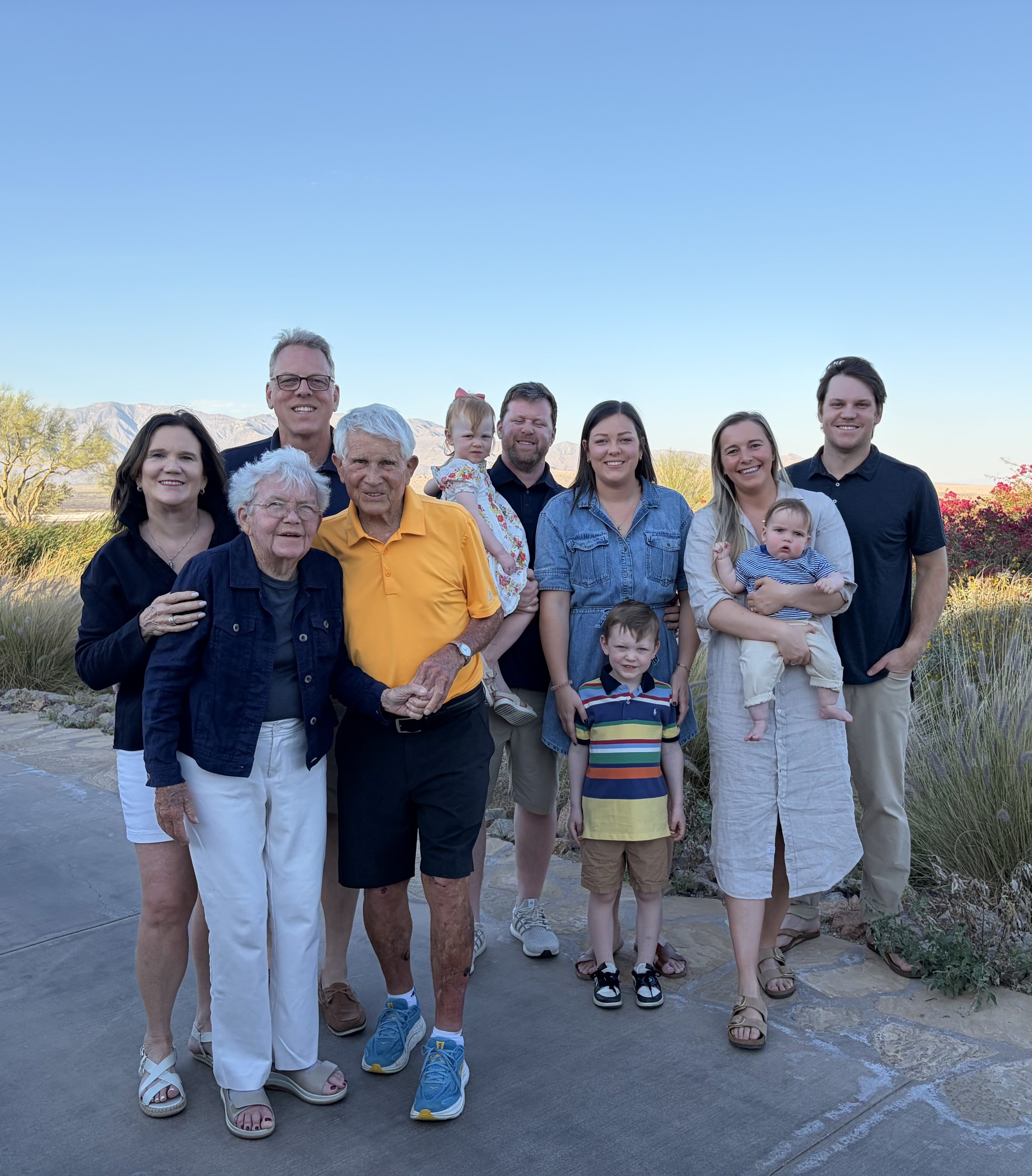 Tim and Kathy (for left) with Tim's parents and their children and grandchildren.