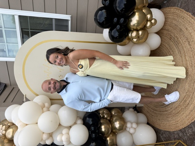 Reece and his daughter at her graduation