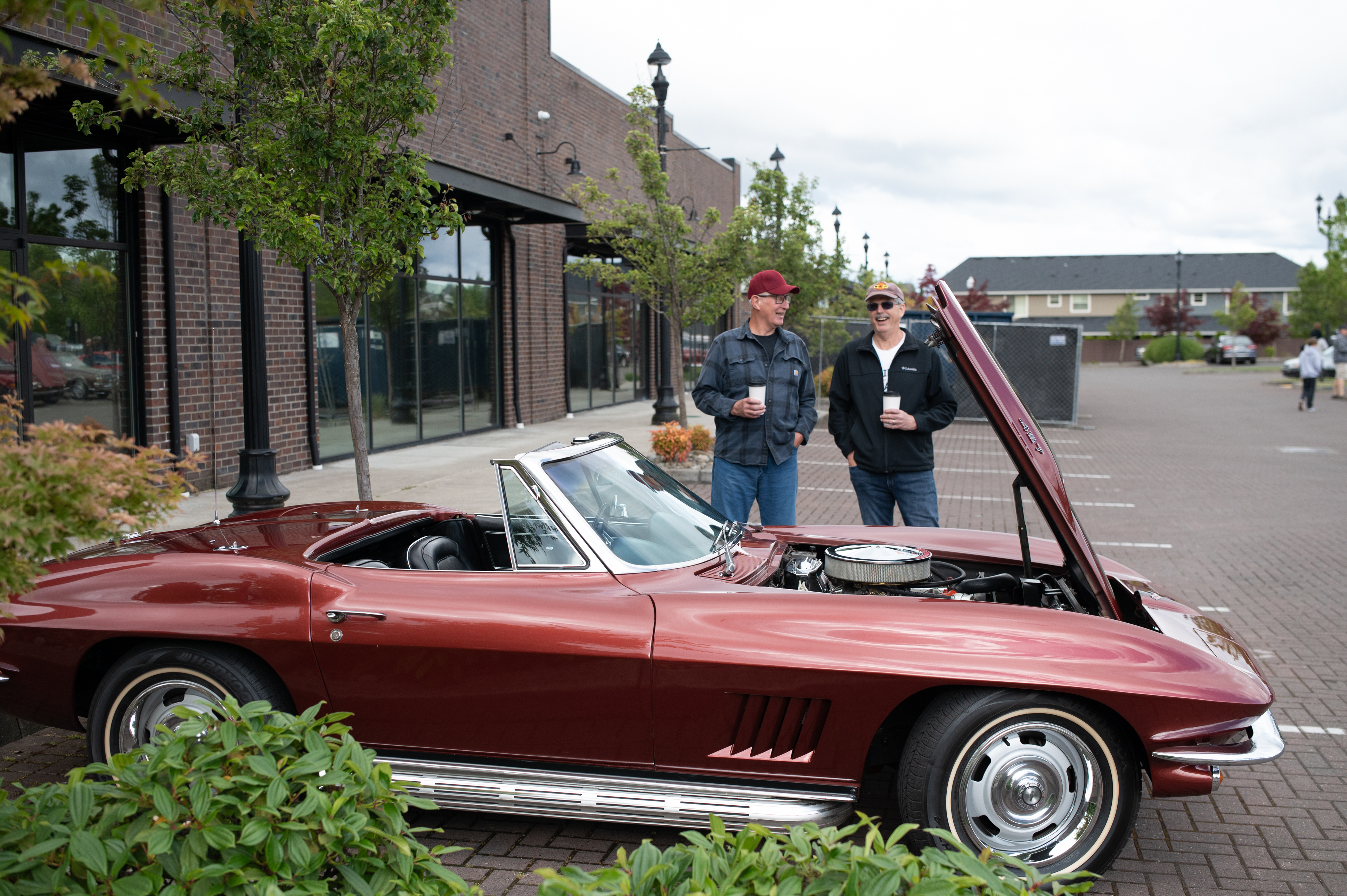 A classic Chevrolet Corvette draws attention during Felida Cars & Coffee at Creed Coffee, where the community gathers over coffee, conversation, and a shared love of automobiles.