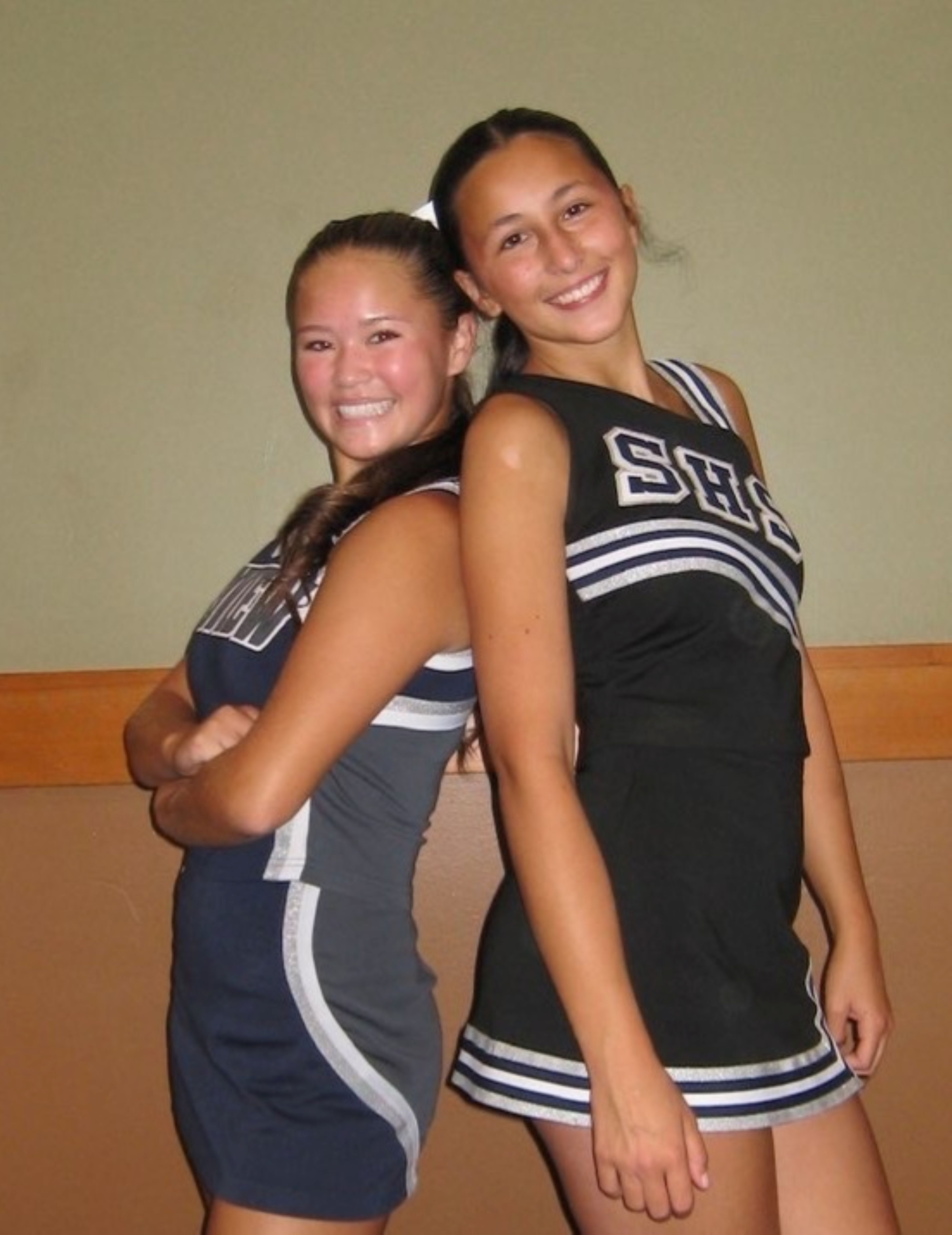 Sophie Smith and Kenzie Gee share a smile during cheer camp at Great Wolf Lodge. The pair enjoyed being each other's 