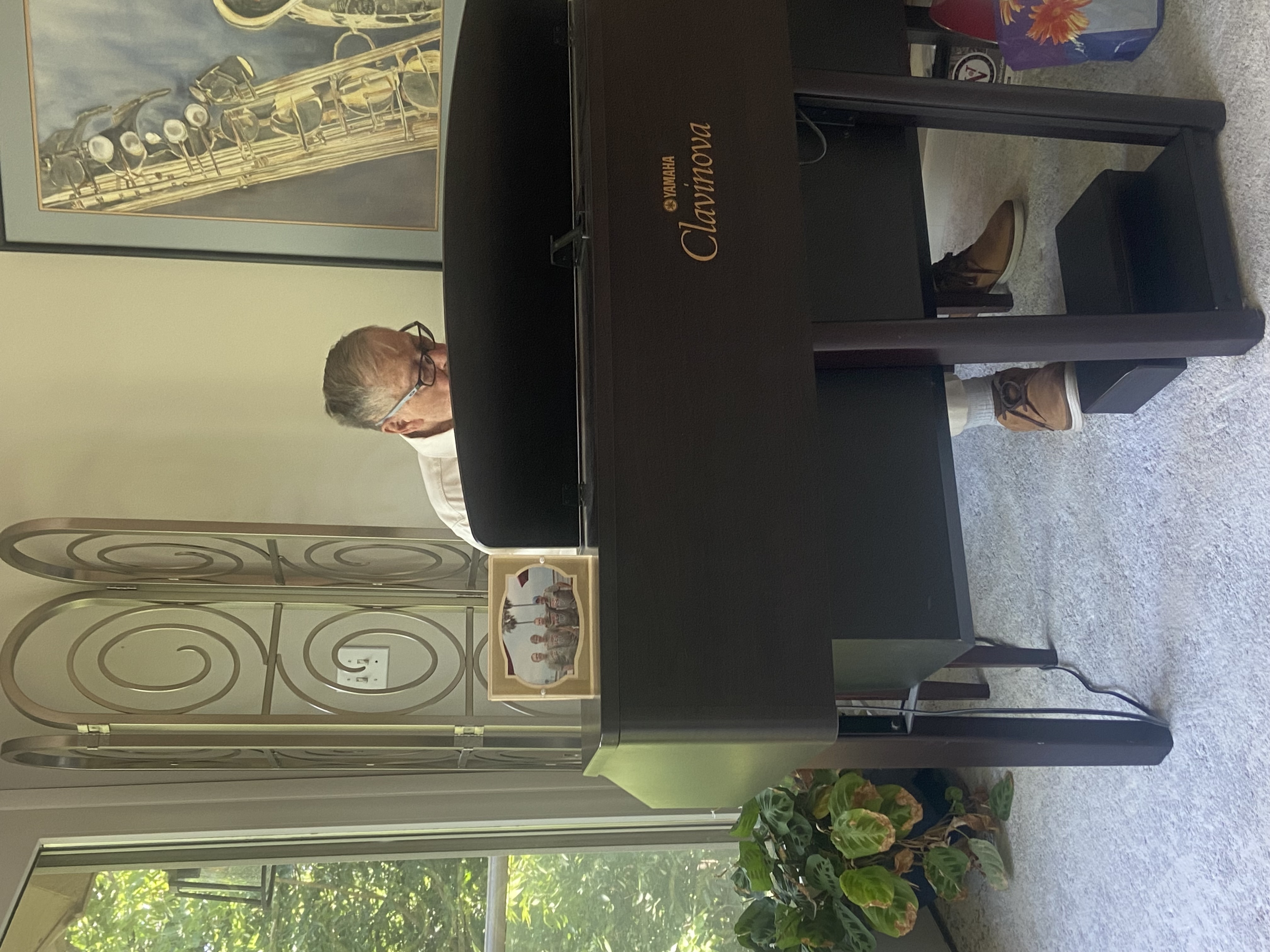 Norm still enjoys playing the piano