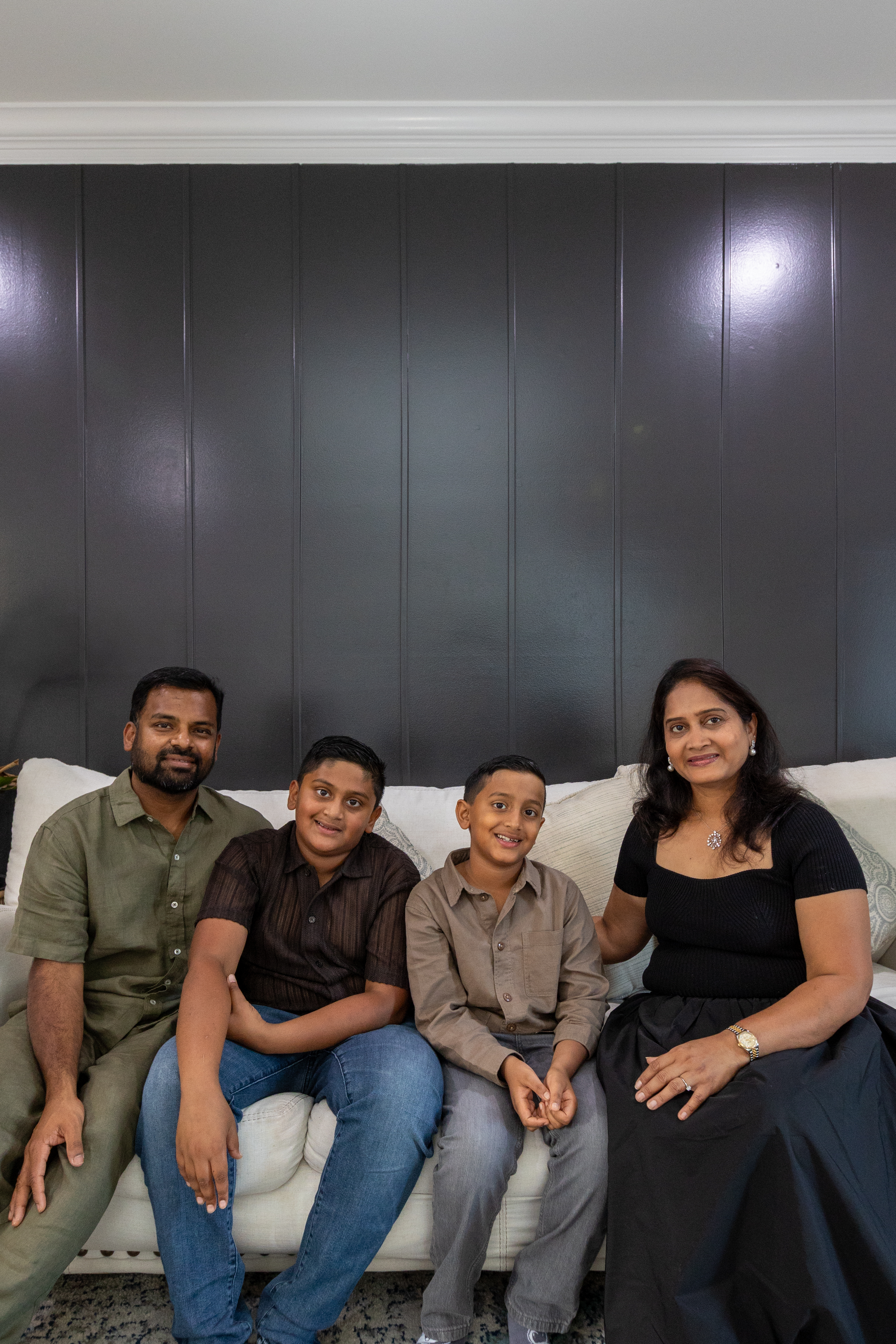 Sandeep with his wife, Archana, and their sons Aryan (left) and Arjun (right).  Photo credit: Ethan Chivari Photography