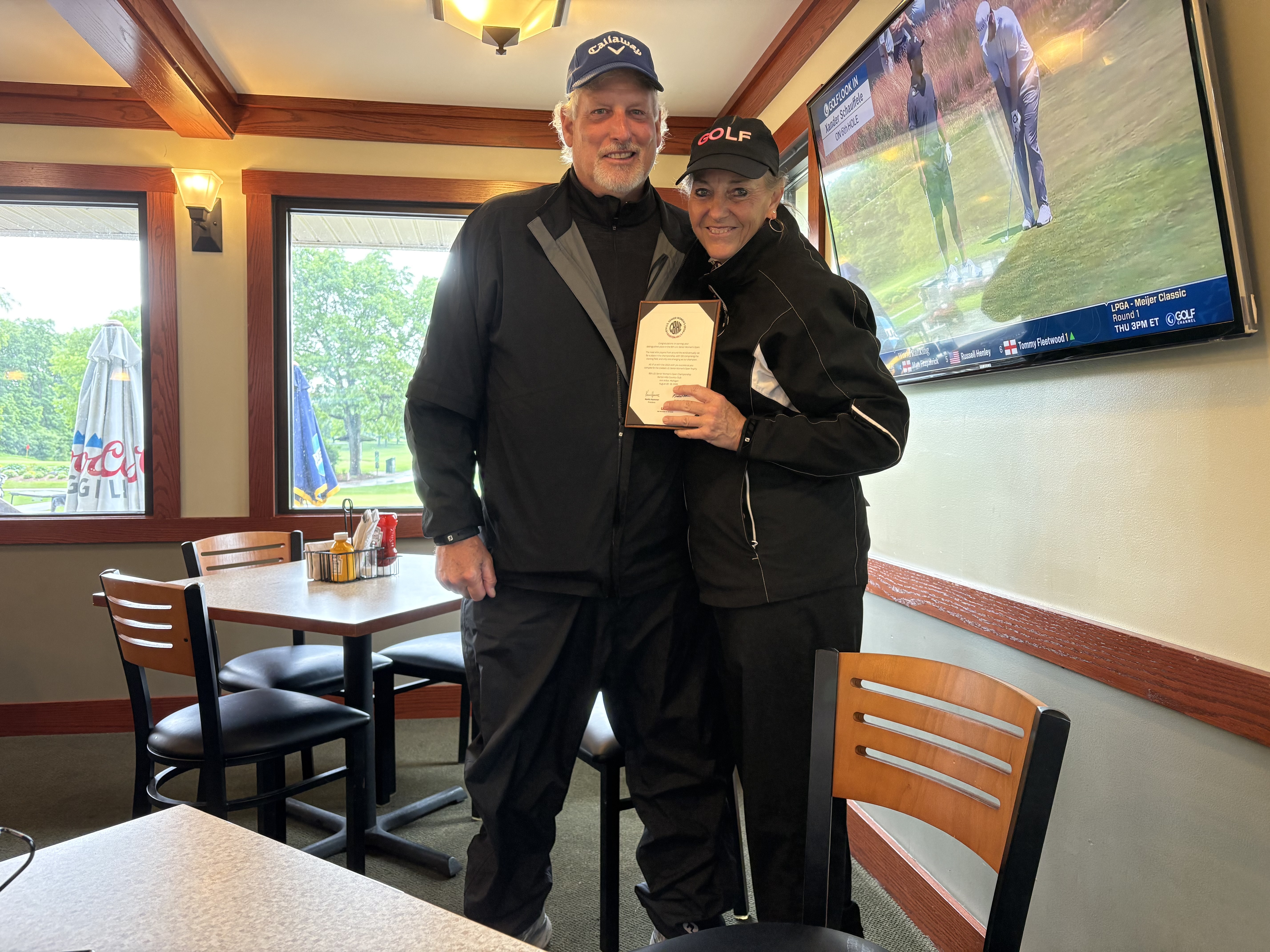 Kirsten celebrates qualifying for the 8th U.S. Senior Women's Open Championship with her significant other and caddie, Mark Di Iorio.