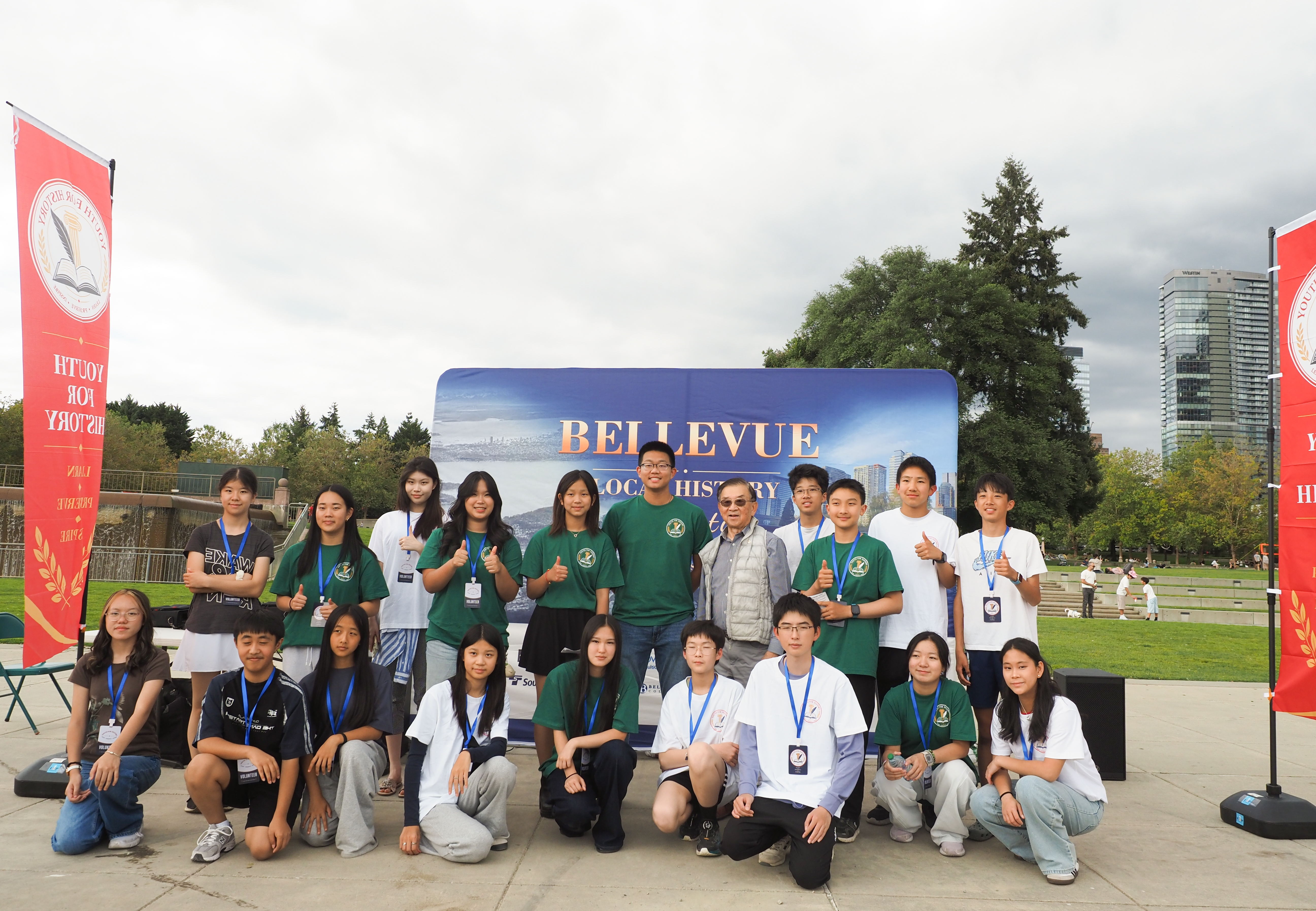 Youth for History volunteers with former Bellevue Mayor and City Councilmember Conrad Lee.