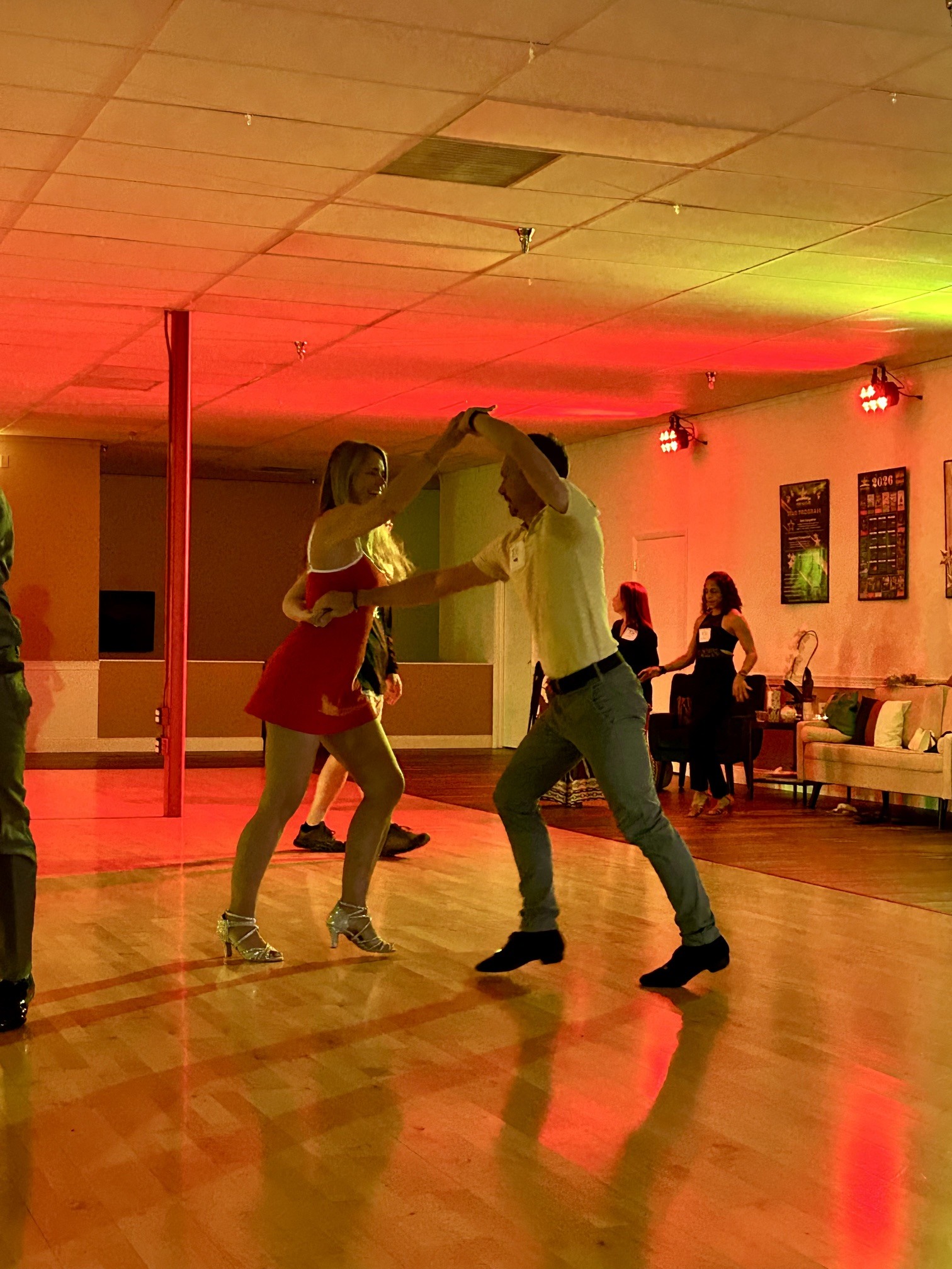 Alex dances with studio co-owner, Tim Pannenga.