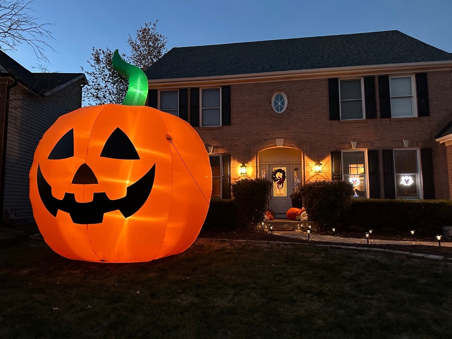 The Blankenship family’s giant inflatable “big pumpkin” has become an eagerly anticipated Halloween tradition for Bennett and Vivienne.
