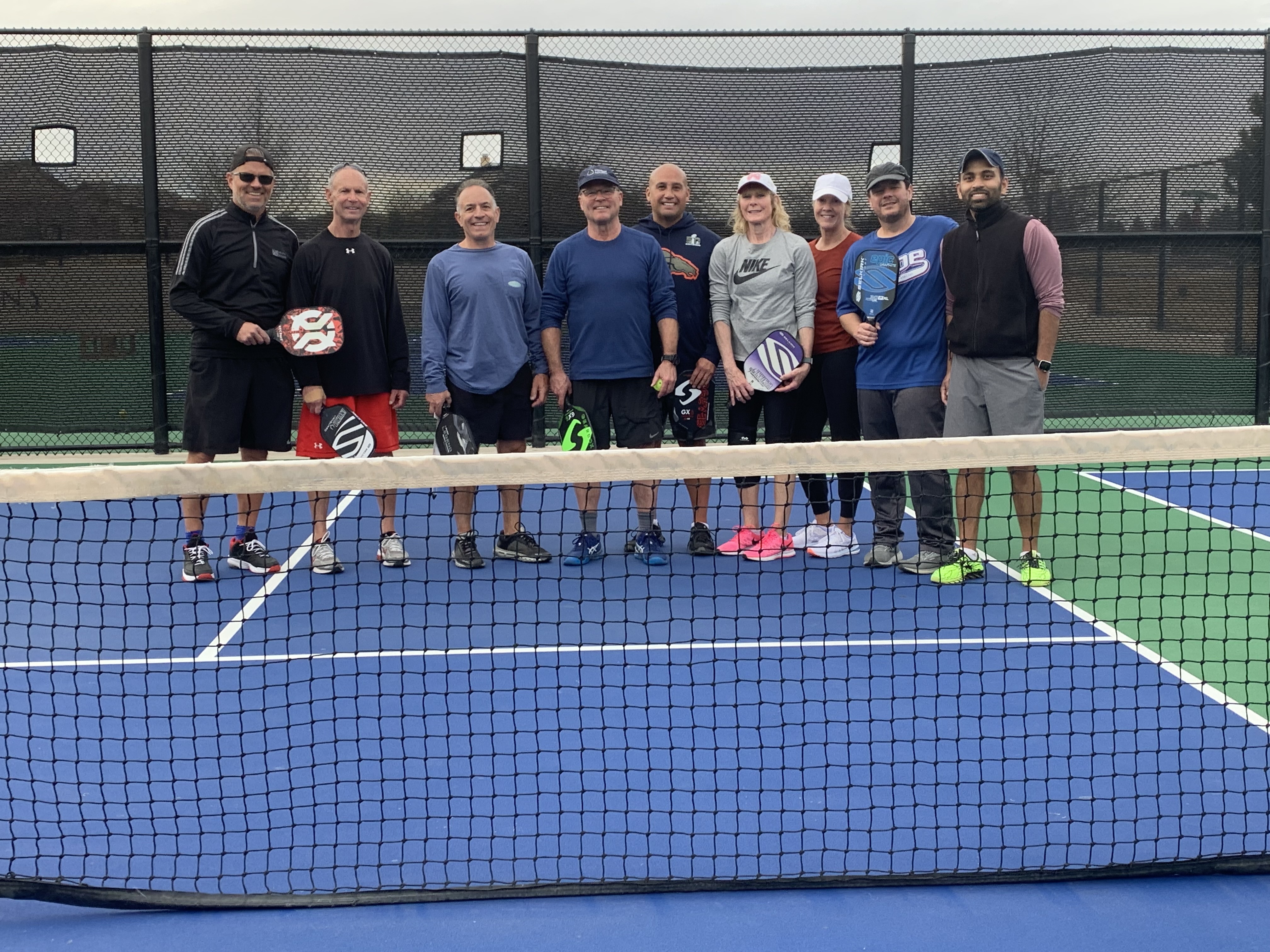 Eight Harmony Pickleball League members participated recently in a clinic on advanced skills with a 4.5-level instructor. Pictured: Eric Engel, Phil Goldstein (clinic organizer), Chris Serafin, Russ Cowart (clinic instructor), Caesar Montoya, Amy Goldstein, Hollyn Engel, Michael Malone, and Ashwin Ganta; photo
credit to Nikhil Ganta. Additional clinics available upon request.